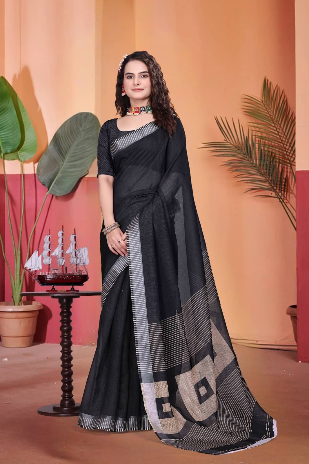 Apnisha Linen Printed Saree With Unstitched Blouse Piece ( Black ) Apnisha Linen Printed Saree With Unstitched Blouse Piece ( Black )