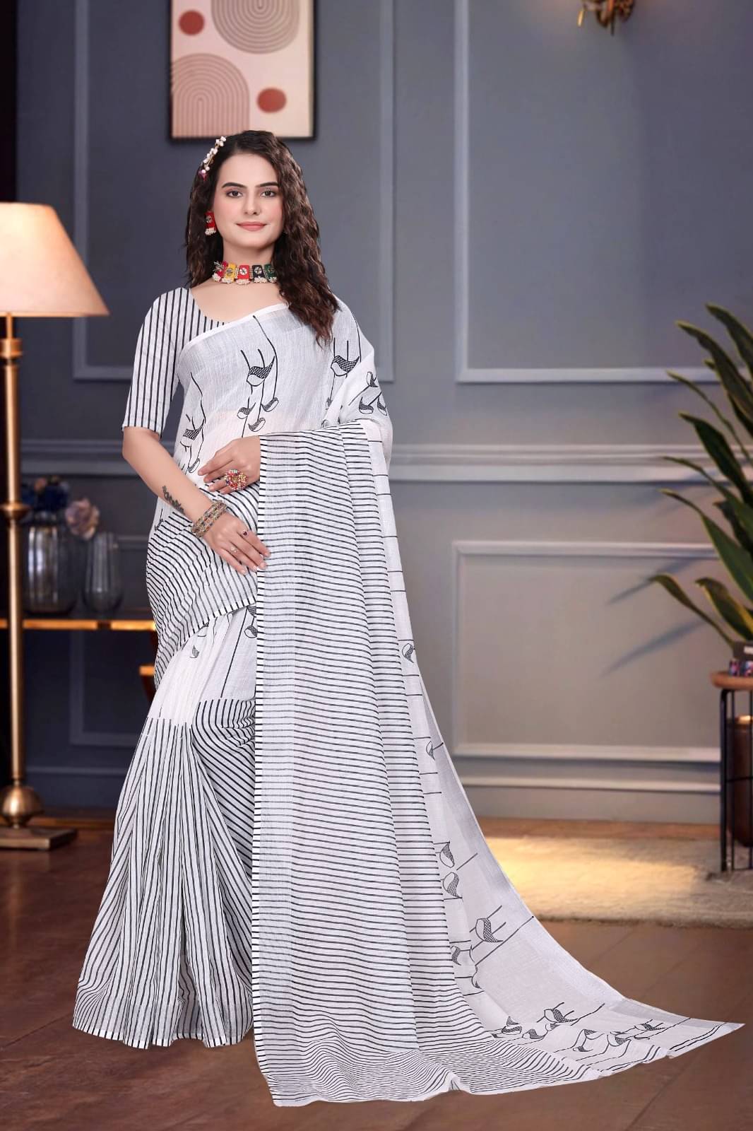 Apnisha Linen Printed Saree With Unstitched Blouse Piece ( White ) Apnisha Linen Printed Saree With Unstitched Blouse Piece ( White )