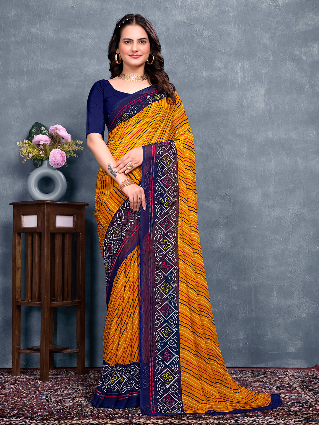 Kanooda Prints Georgette Printed Saree With Unstitched Blouse Piece ( Navy Blue ) Kanooda Prints Georgette Printed Saree With Unstitched Blouse Piece ( Navy Blue )