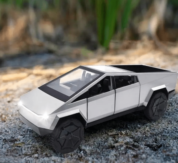    			1:32 Scale Tesla Cybertruck Toy Car – Die-Cast Metal with Pull Back Action, Random Color, Futuristic Model for Kids & Collectors