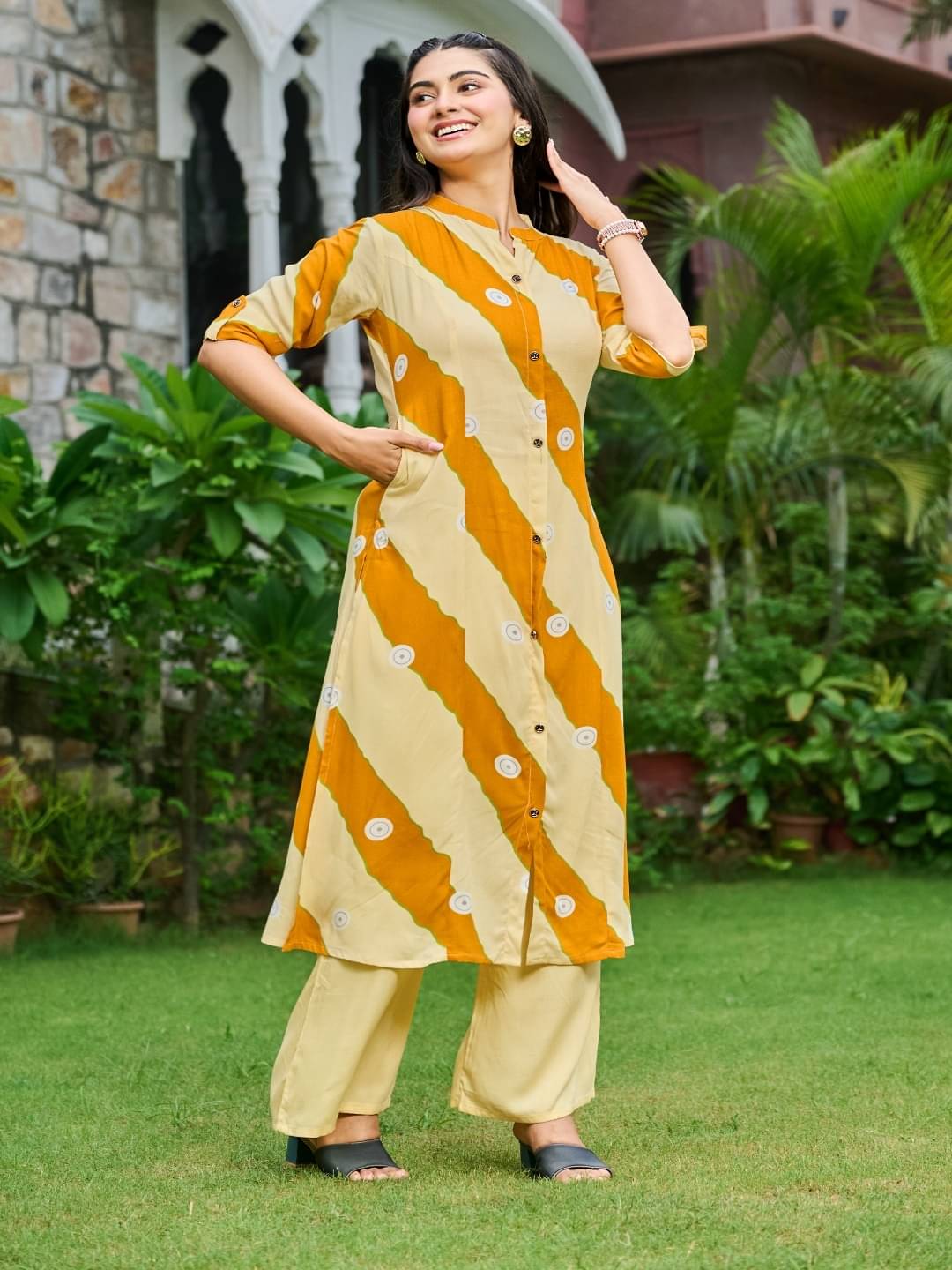     			YAGNIK FASHION Women Rayon Solid A-line Kurti With Palazzo ( Yellow )