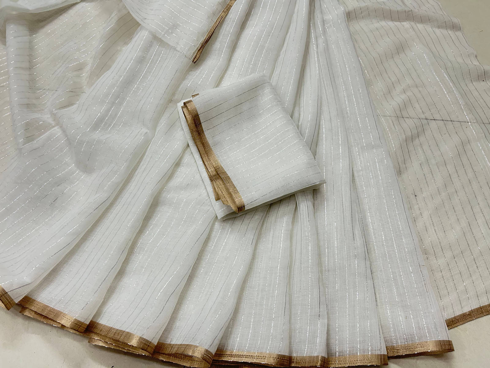 BYUPRI Linen Woven Leheriya Saree With Unstitched Blouse Piece ( White )     			BYUPRI Linen Woven Leheriya Saree With Unstitched Blouse Piece ( White )