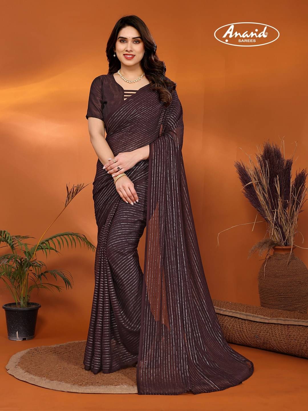     			ANAND SAREES Georgette Embellished Saree With Unstitched Blouse Piece ( Brown )