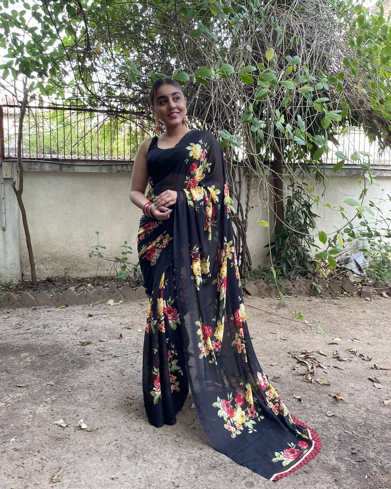 ANAND SAREES Georgette Printed Saree With Unstitched Blouse Piece ( Black ) ANAND SAREES Georgette Printed Saree With Unstitched Blouse Piece ( Black )