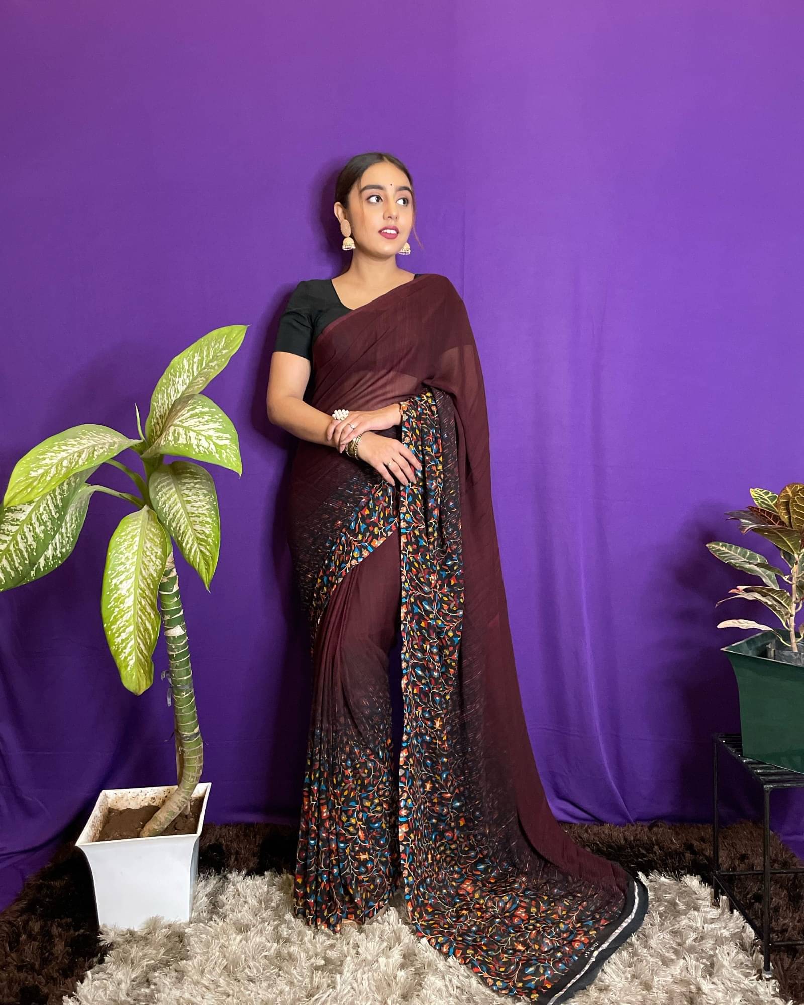 ANAND SAREES Georgette Printed Saree With Unstitched Blouse Piece ( Brown ) ANAND SAREES Georgette Printed Saree With Unstitched Blouse Piece ( Brown )
