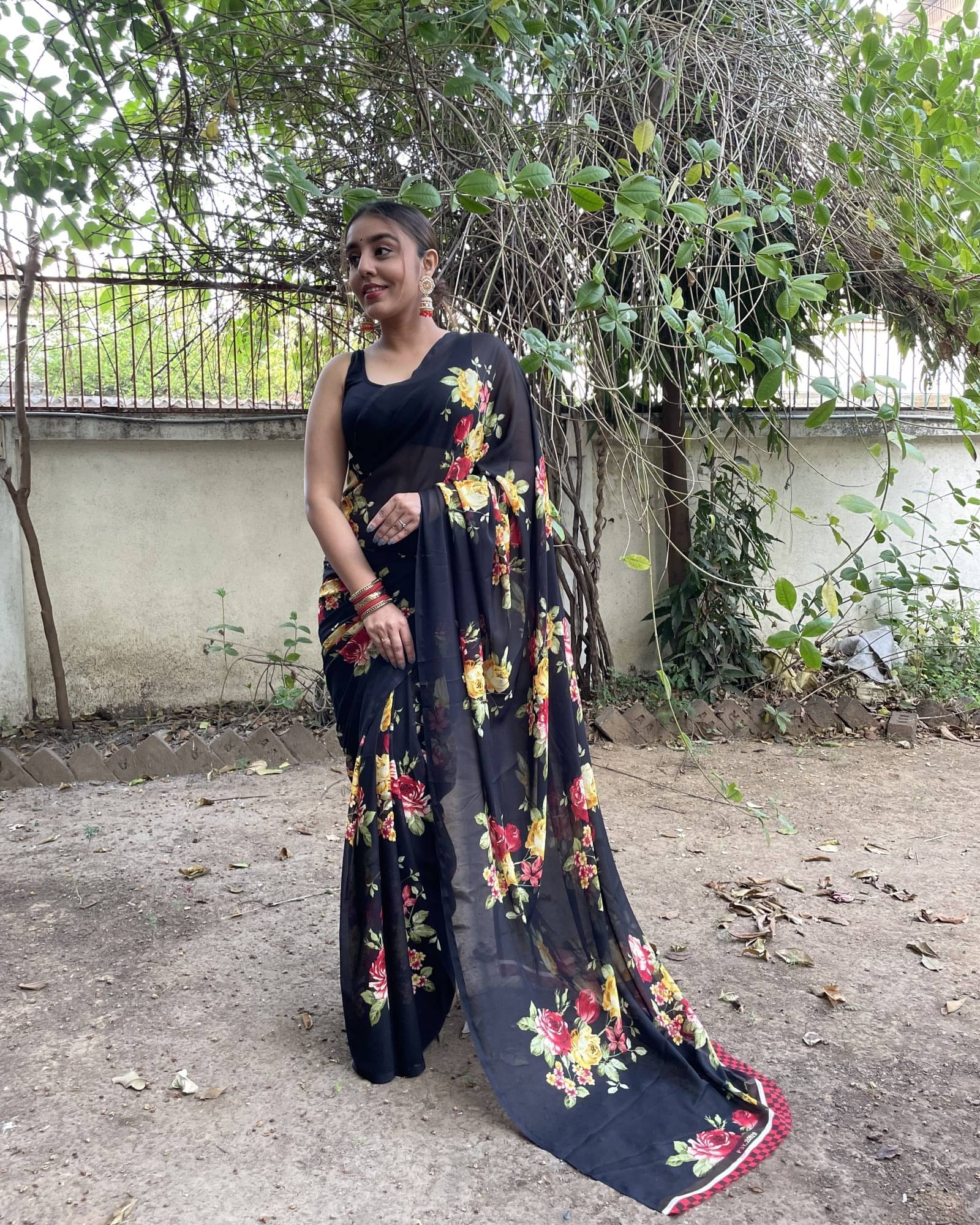 ANAND SAREES Georgette Printed Saree With Unstitched Blouse Piece ( Black ) ANAND SAREES Georgette Printed Saree With Unstitched Blouse Piece ( Black )