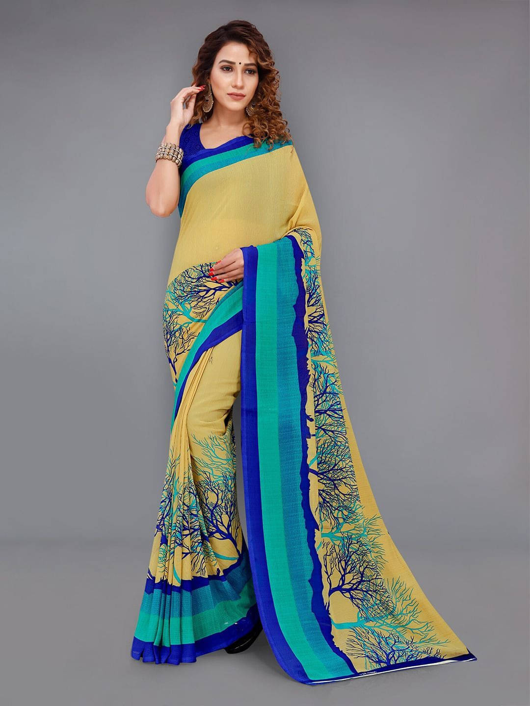 ANAND SAREES Georgette Printed Saree With Unstitched Blouse Piece ( Blue ) ANAND SAREES Georgette Printed Saree With Unstitched Blouse Piece ( Blue )