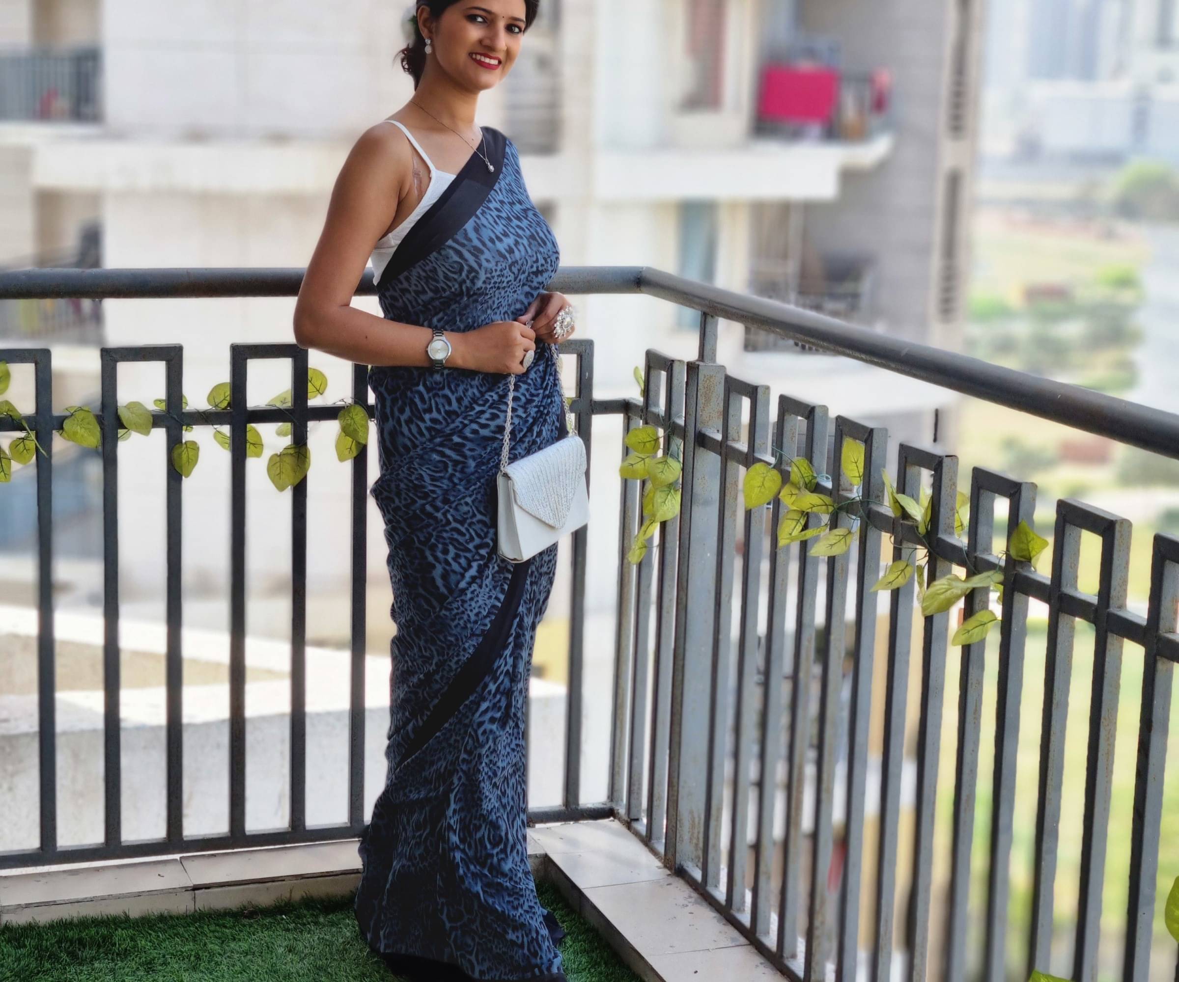 ANAND SAREES Georgette Printed Saree With Unstitched Blouse Piece ( Light Blue ) ANAND SAREES Georgette Printed Saree With Unstitched Blouse Piece ( Light Blue )