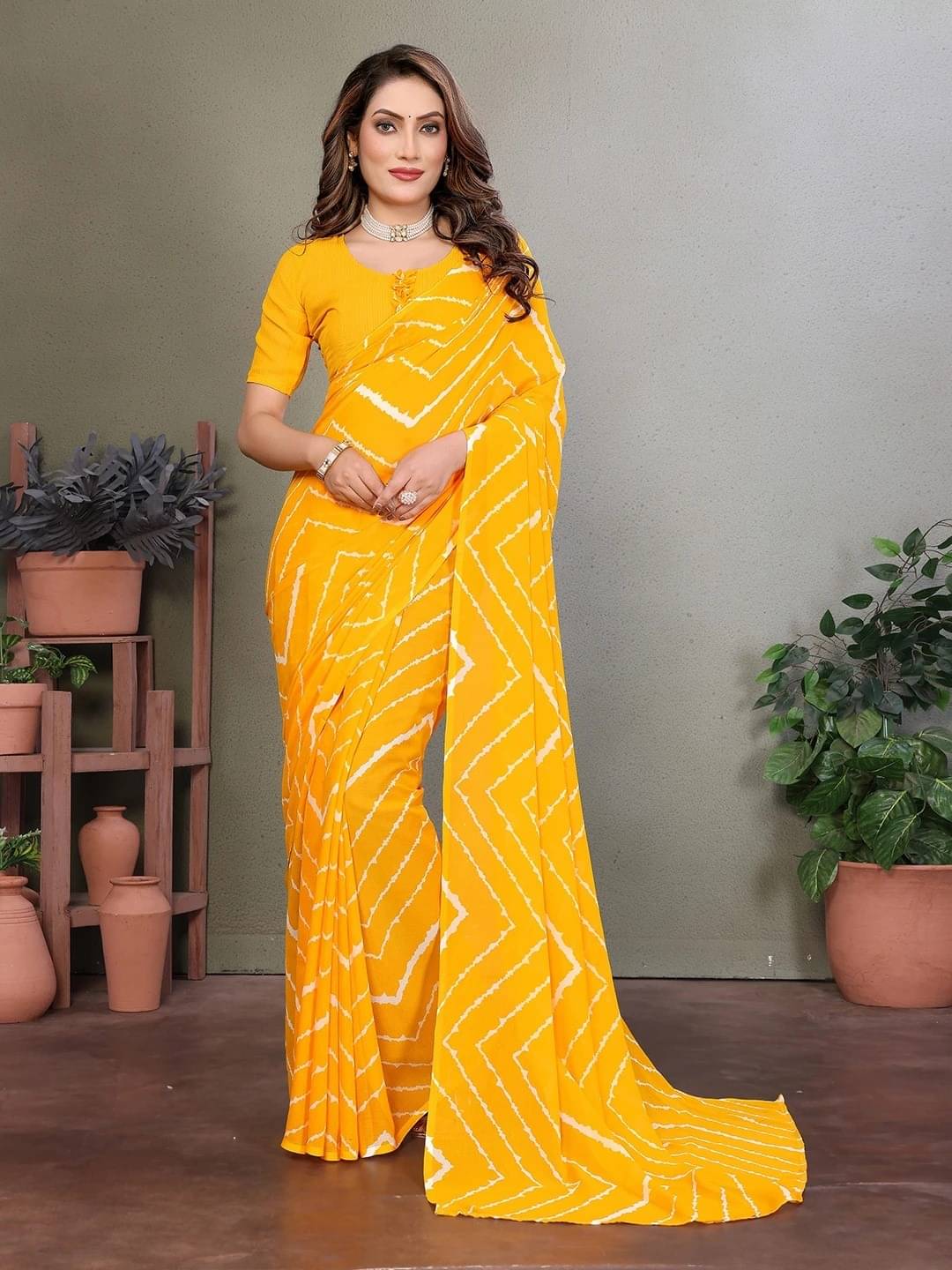ANAND SAREES Georgette Printed Saree With Unstitched Blouse Piece ( Yellow ) ANAND SAREES Georgette Printed Saree With Unstitched Blouse Piece ( Yellow )