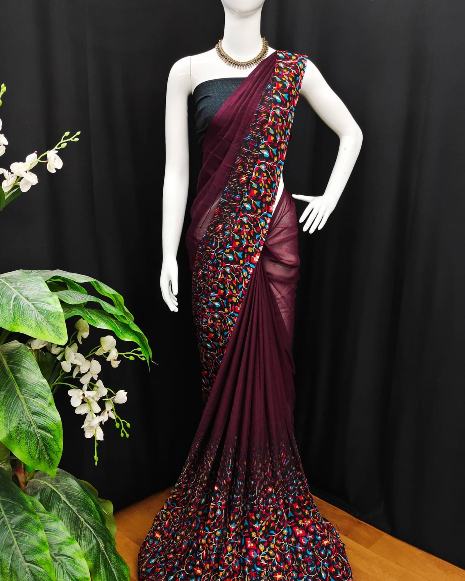 ANAND SAREES Georgette Printed Saree With Unstitched Blouse Piece ( Brown ) ANAND SAREES Georgette Printed Saree With Unstitched Blouse Piece ( Brown )