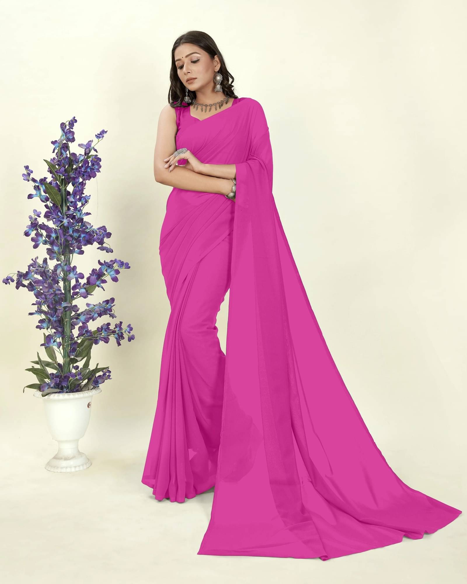 ANAND SAREES Georgette Solid Saree With Unstitched Blouse Piece ( Pink ) ANAND SAREES Georgette Solid Saree With Unstitched Blouse Piece ( Pink )