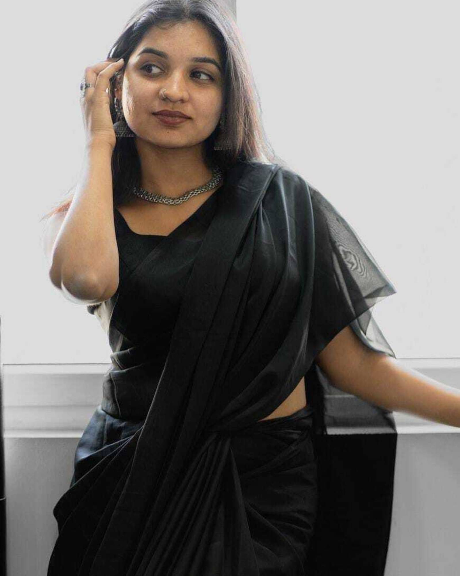 ANAND SAREES Georgette Solid Saree With Unstitched Blouse Piece ( Black ) ANAND SAREES Georgette Solid Saree With Unstitched Blouse Piece ( Black )