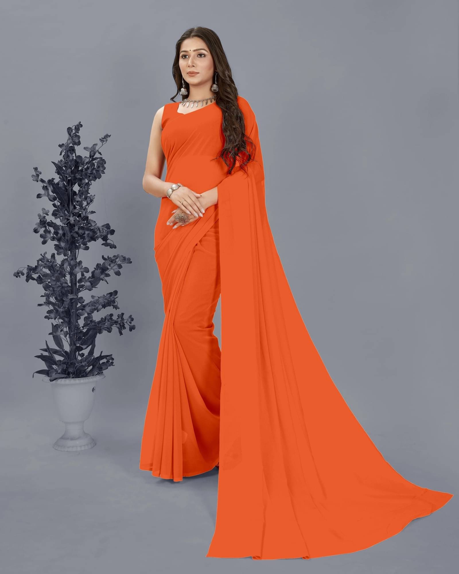 ANAND SAREES Georgette Solid Saree With Unstitched Blouse Piece ( Orange )     			ANAND SAREES Georgette Solid Saree With Unstitched Blouse Piece ( Orange )