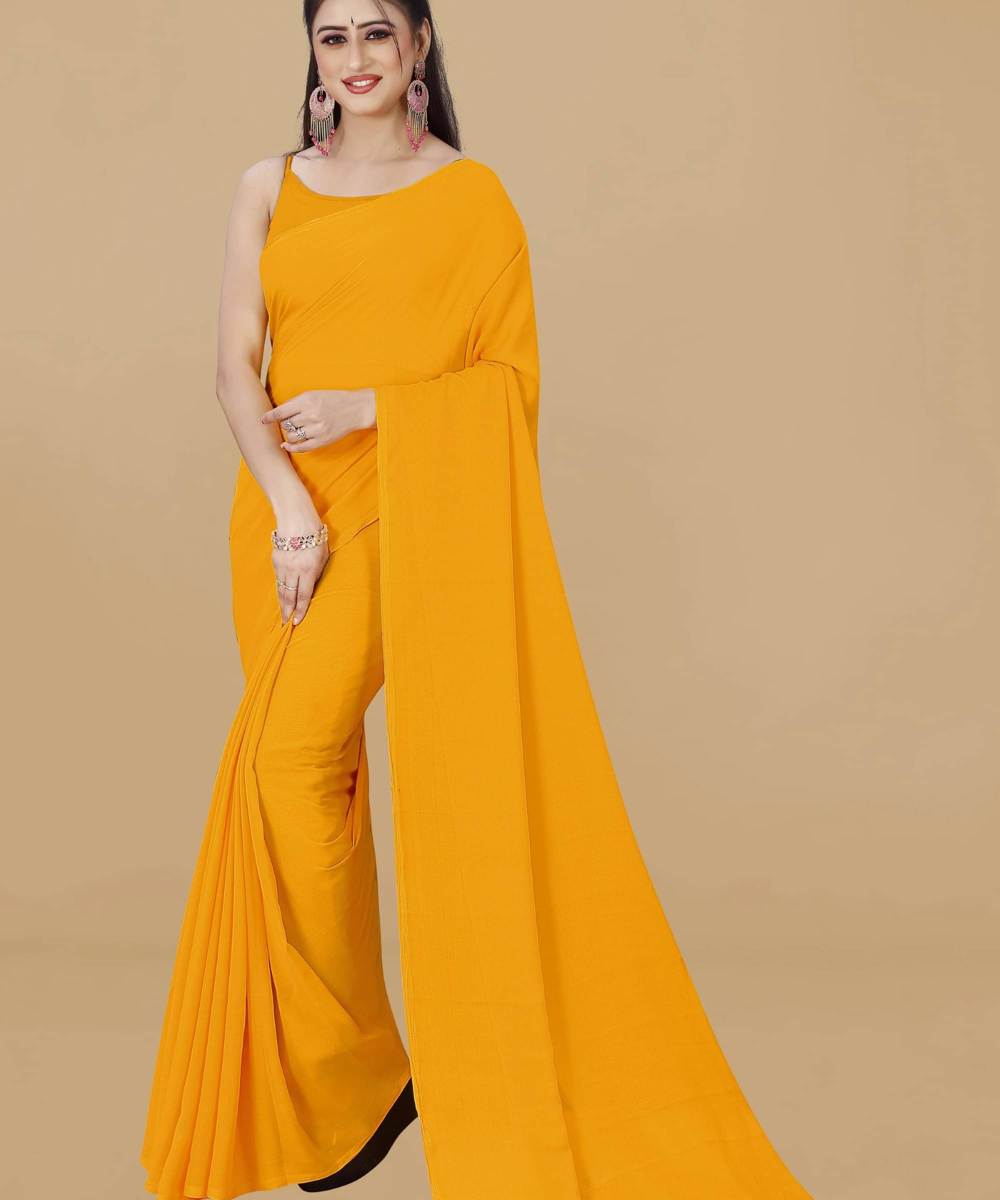 ANAND SAREES Georgette Solid Saree Without Blouse Piece ( Orange ) ANAND SAREES Georgette Solid Saree Without Blouse Piece ( Orange )