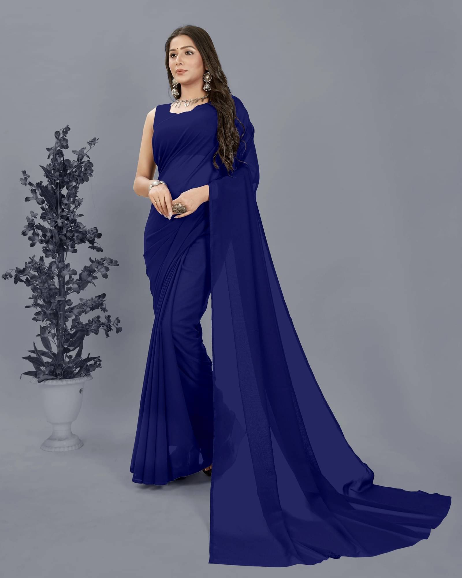 ANAND SAREES Georgette Solid Saree With Unstitched Blouse Piece ( Navy Blue ) ANAND SAREES Georgette Solid Saree With Unstitched Blouse Piece ( Navy Blue )