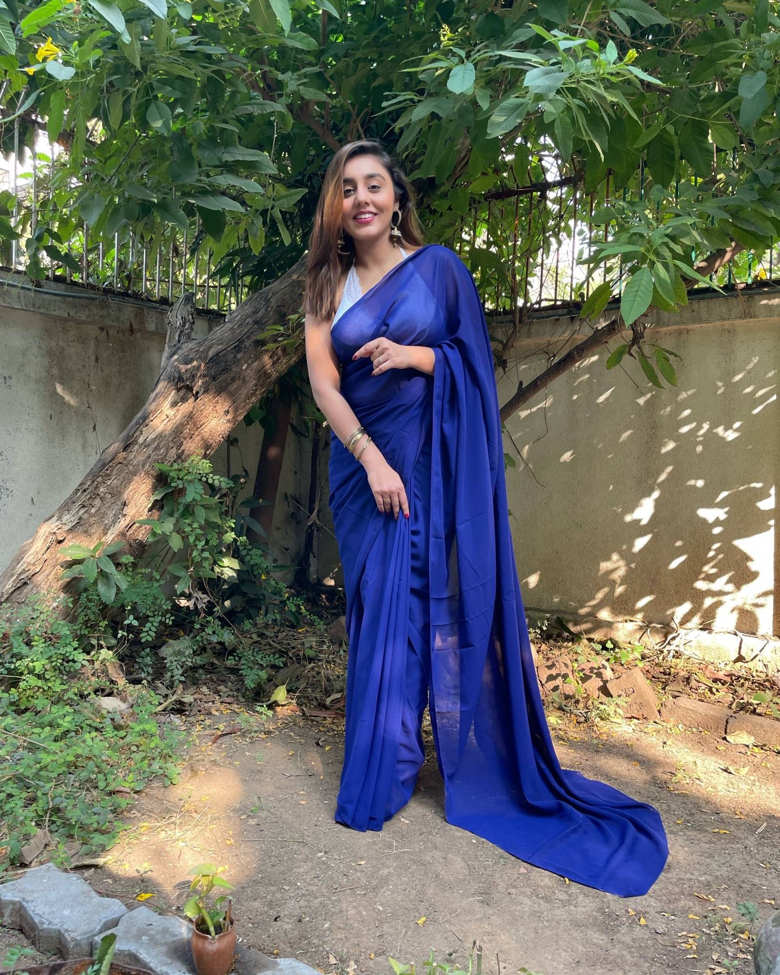 ANAND SAREES Georgette Solid Saree With Unstitched Blouse Piece ( Blue ) ANAND SAREES Georgette Solid Saree With Unstitched Blouse Piece ( Blue )