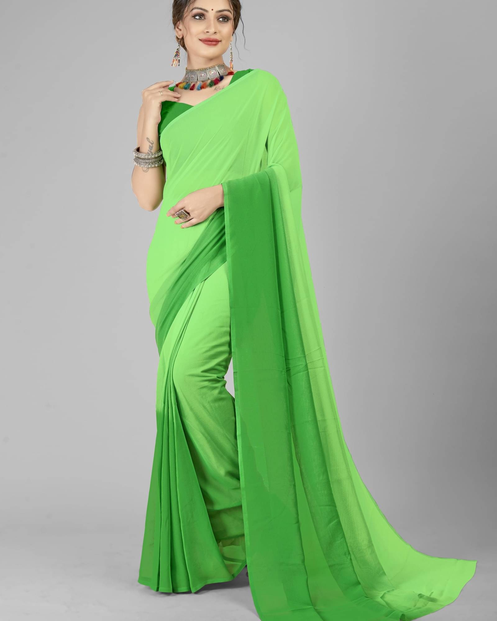 ANAND SAREES Georgette Solid Saree With Unstitched Blouse Piece ( Green ) ANAND SAREES Georgette Solid Saree With Unstitched Blouse Piece ( Green )