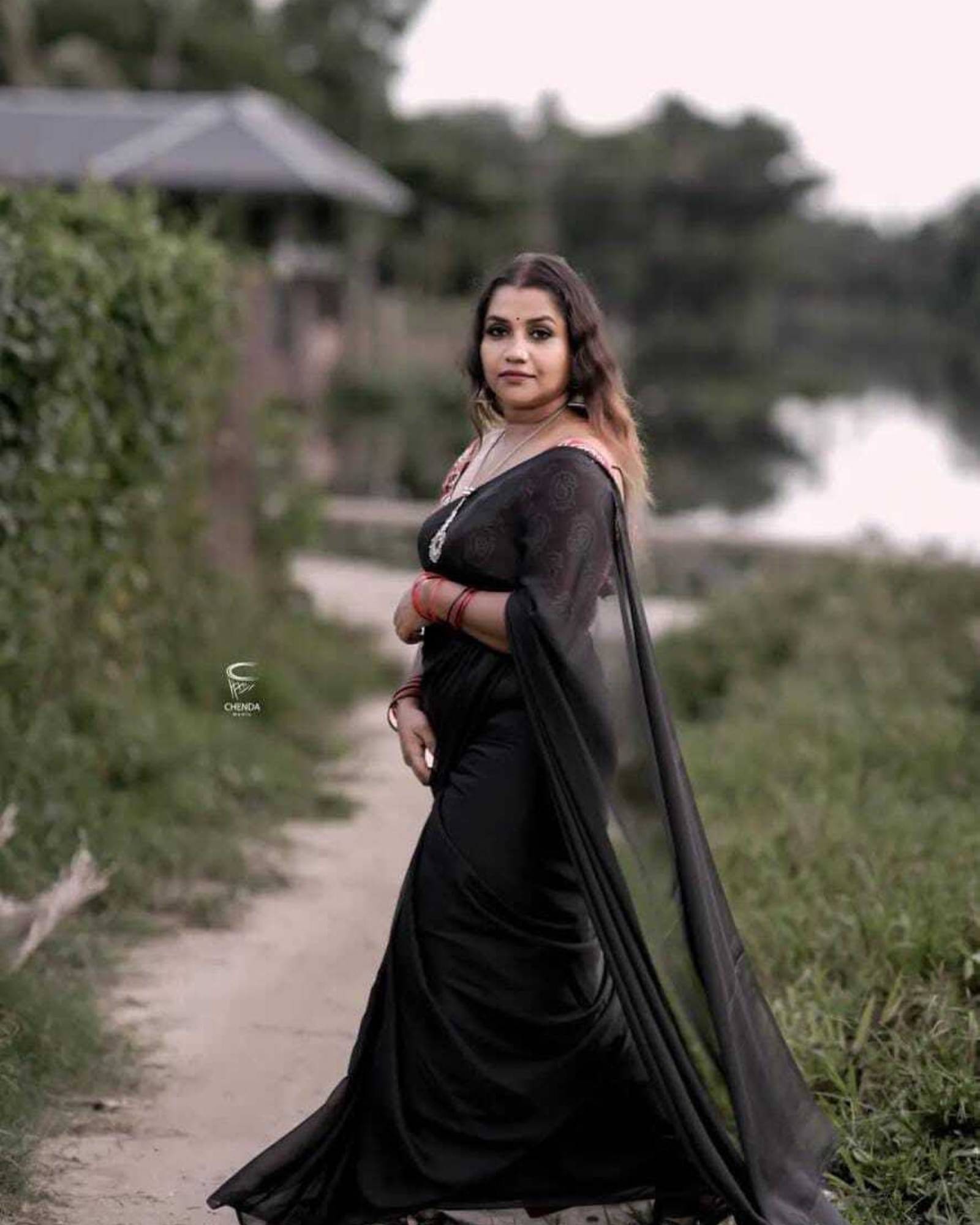 ANAND SAREES Georgette Solid Saree With Unstitched Blouse Piece ( Black ) ANAND SAREES Georgette Solid Saree With Unstitched Blouse Piece ( Black )