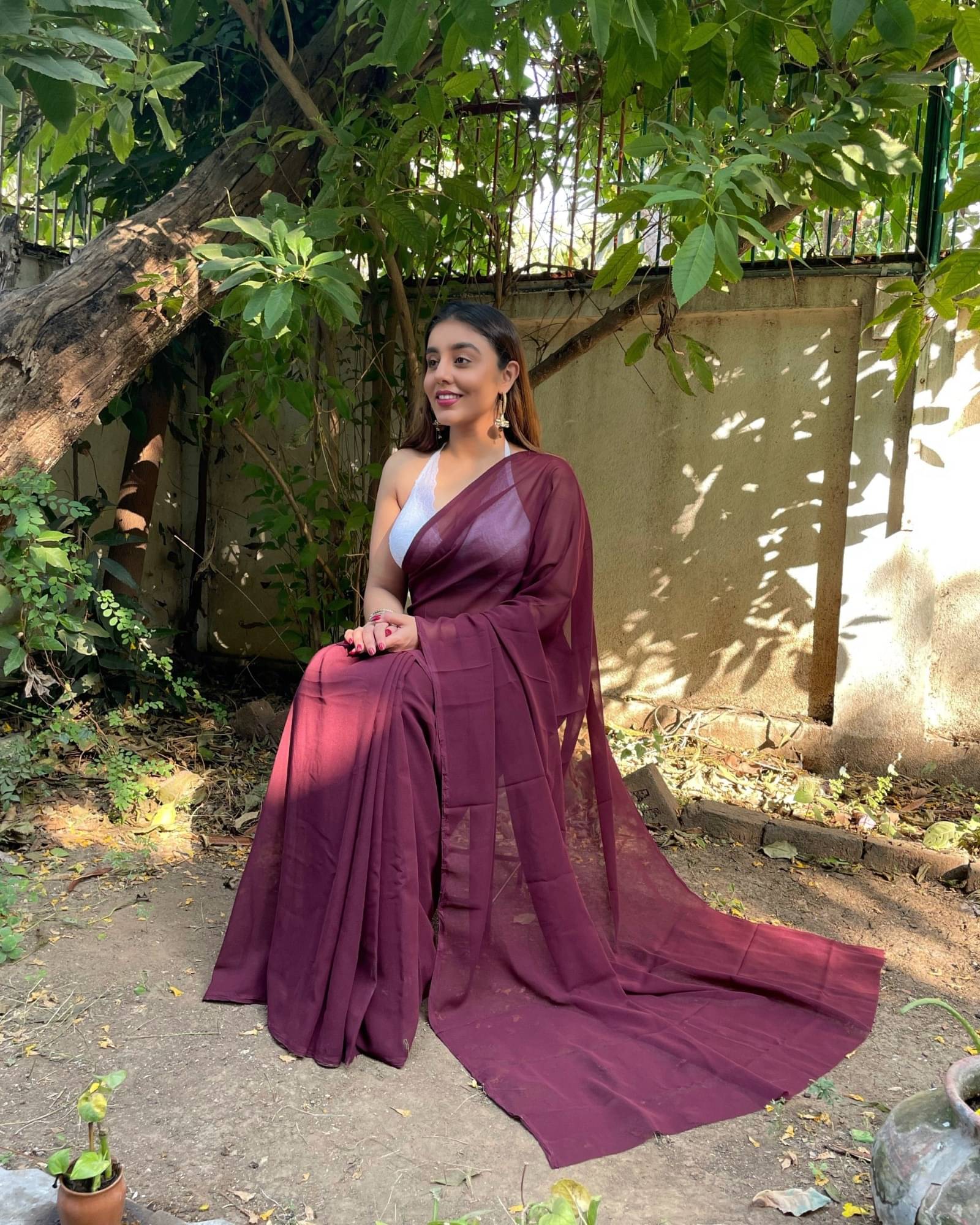 ANAND SAREES Georgette Solid Saree With Unstitched Blouse Piece ( Brown ) ANAND SAREES Georgette Solid Saree With Unstitched Blouse Piece ( Brown )