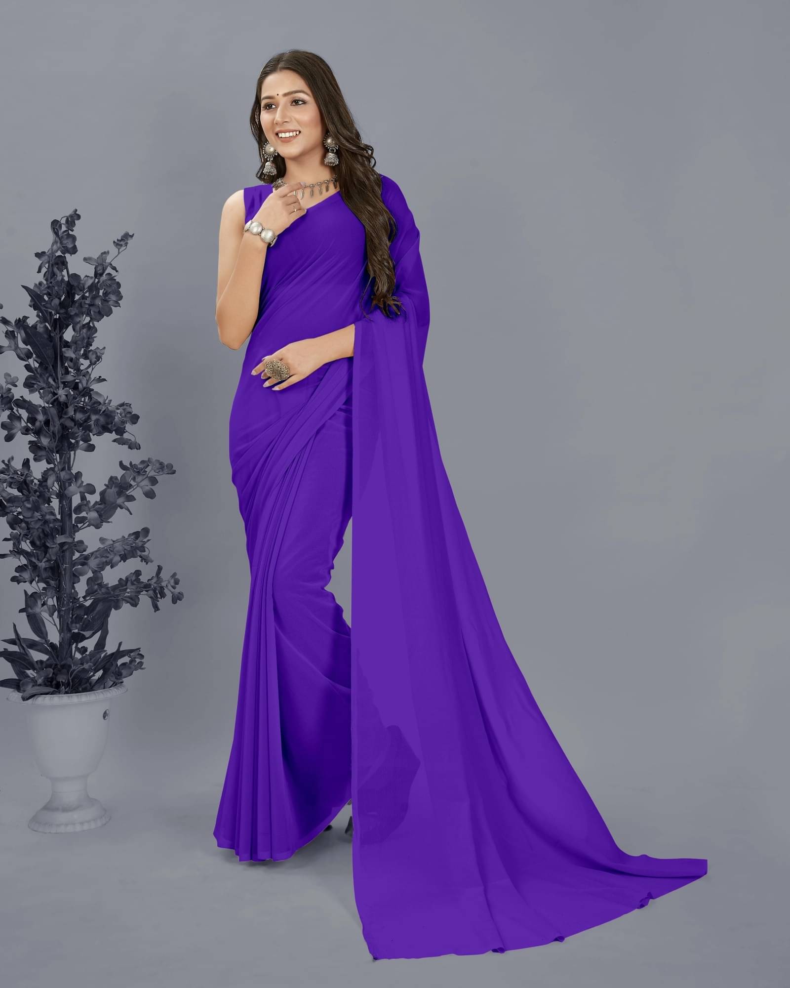 ANAND SAREES Georgette Solid Saree With Unstitched Blouse Piece ( Purple ) ANAND SAREES Georgette Solid Saree With Unstitched Blouse Piece ( Purple )