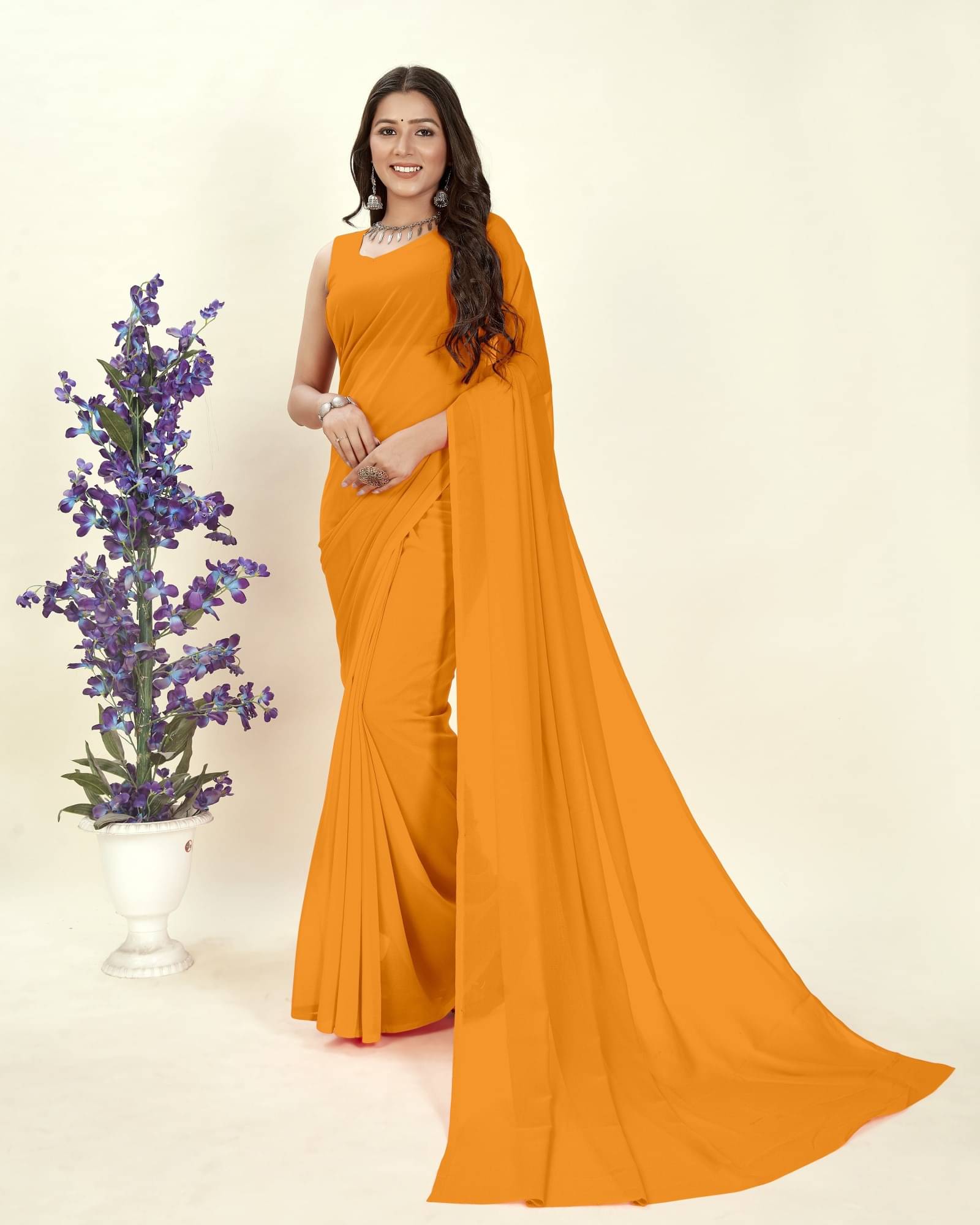 ANAND SAREES Georgette Solid Saree With Unstitched Blouse Piece ( Yellow ) ANAND SAREES Georgette Solid Saree With Unstitched Blouse Piece ( Yellow )