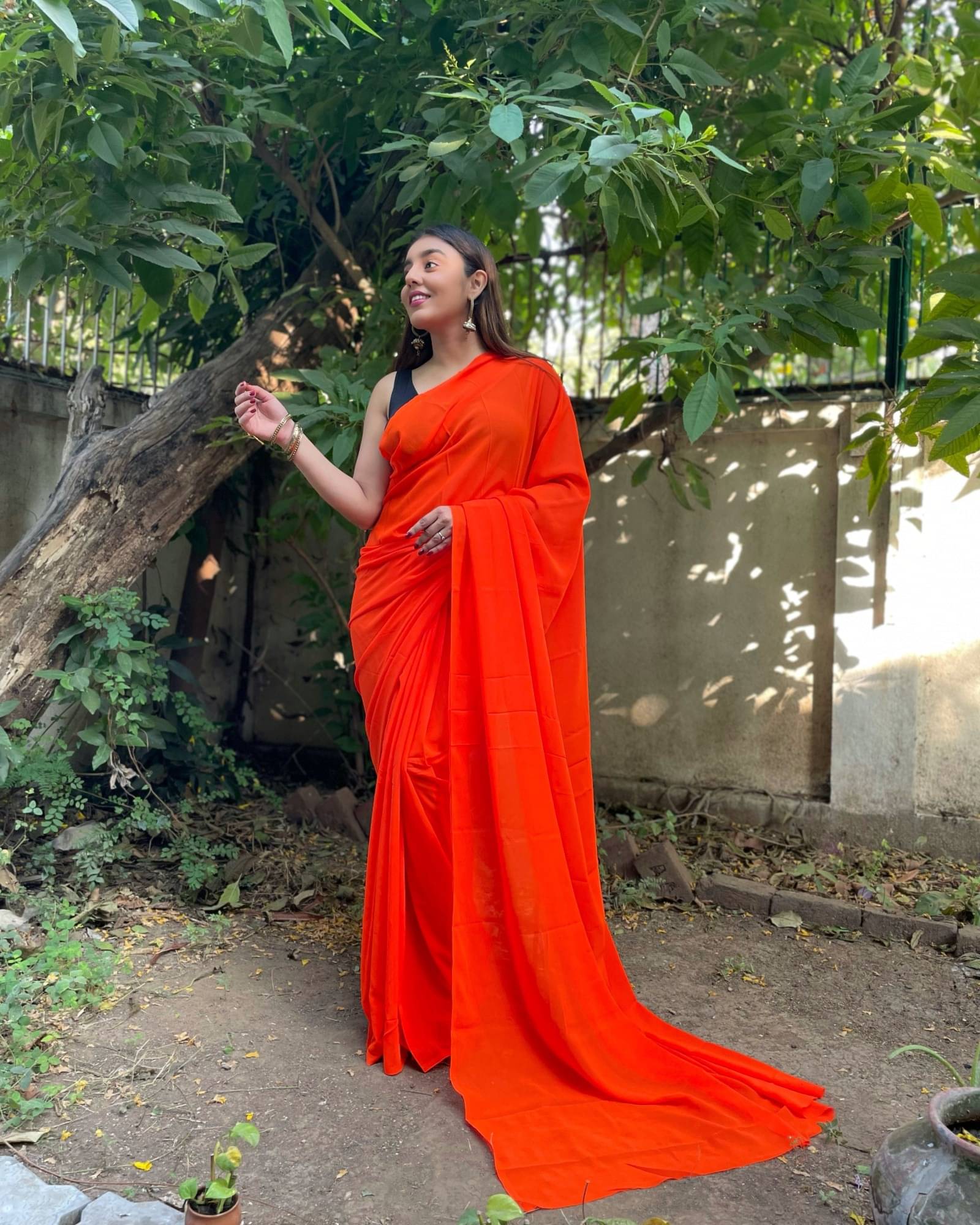     			ANAND SAREES Georgette Solid Saree With Unstitched Blouse Piece ( Orange )