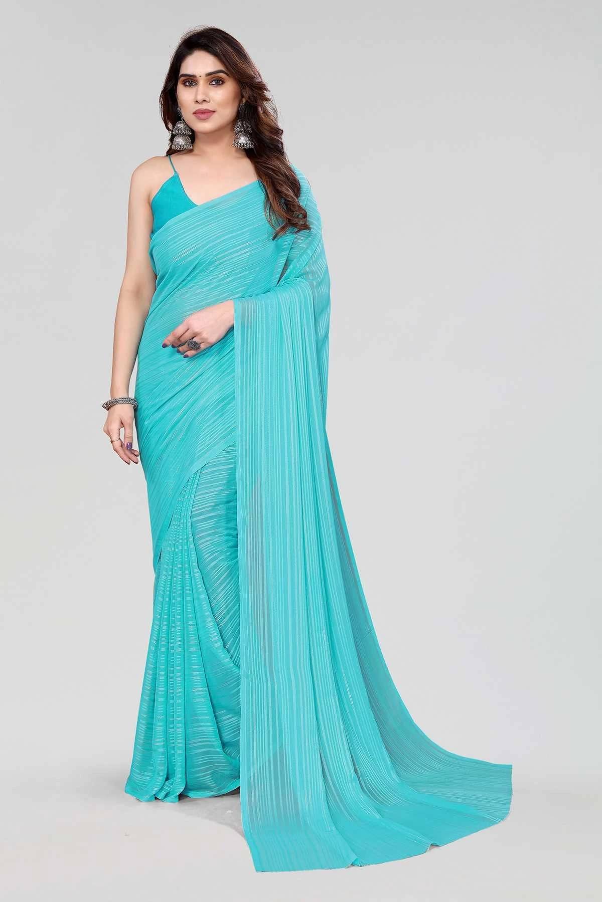 ANAND SAREES Satin Printed Saree With Unstitched Blouse Piece ( Light Blue ) ANAND SAREES Satin Printed Saree With Unstitched Blouse Piece ( Light Blue )