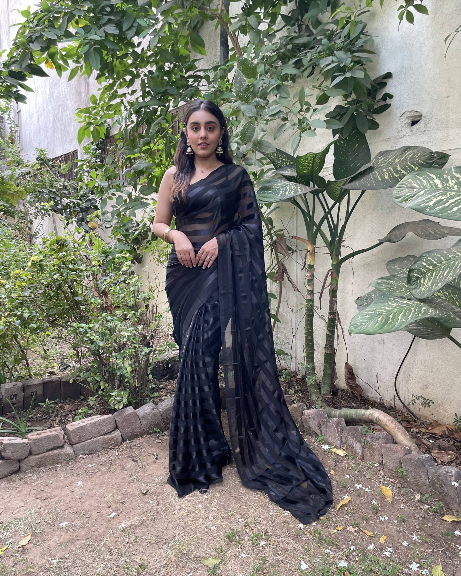 ANAND SAREES Satin Striped Saree With Unstitched Blouse Piece ( Black ) ANAND SAREES Satin Striped Saree With Unstitched Blouse Piece ( Black )