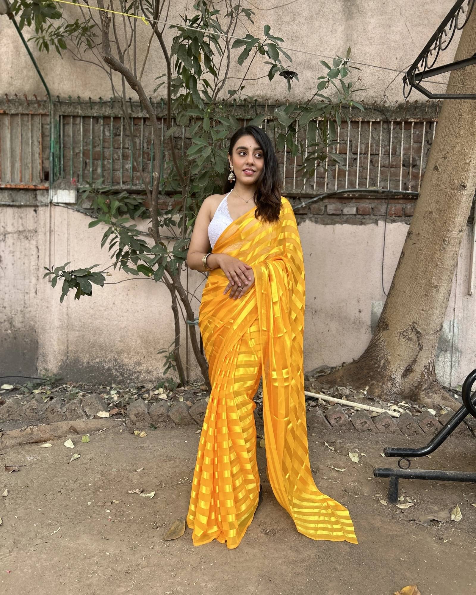 ANAND SAREES Satin Striped Saree With Unstitched Blouse Piece ( Yellow ) ANAND SAREES Satin Striped Saree With Unstitched Blouse Piece ( Yellow )