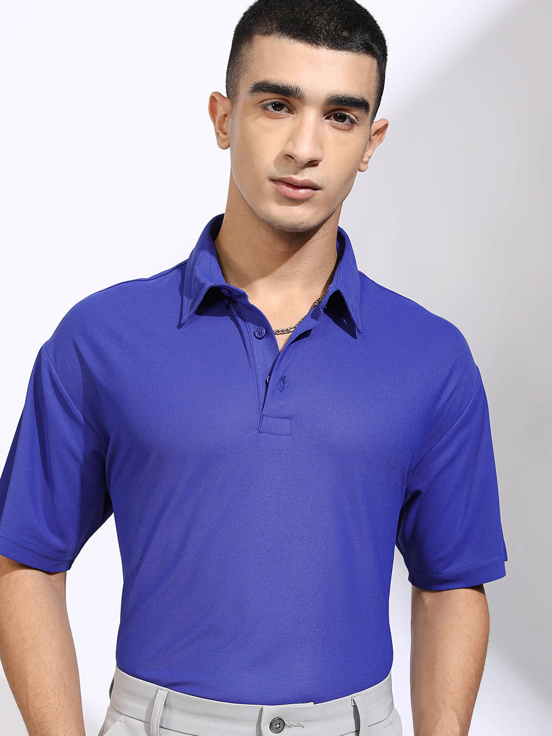 Highlander Men Polyester Relaxed Fit Solid Polo T Shirt ( Blue ) Highlander Men Polyester Relaxed Fit Solid Polo T Shirt ( Blue )