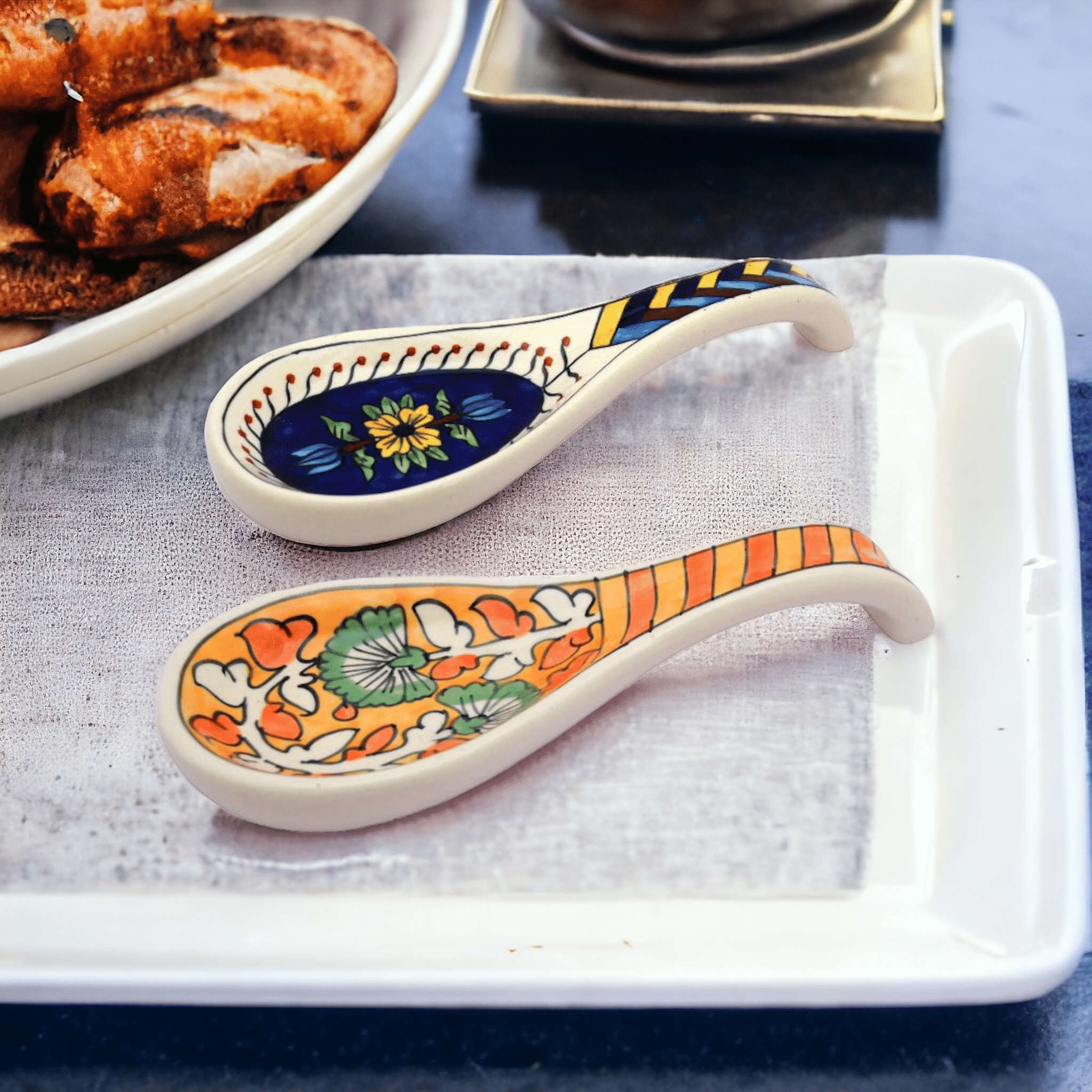 Malaikah Orange And Blue Long Spoon Rest Ceramic Table Spoon Multi Color ( Pack of 2 ) Malaikah Orange And Blue Long Spoon Rest Ceramic Table Spoon Multi Color ( Pack of 2 )