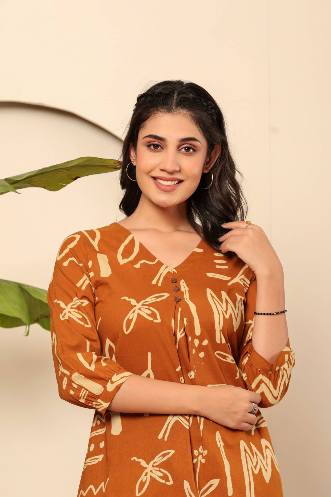 Adaa Women Cotton Printed Straight Kurti With Pants ( Brown ) Adaa Women Cotton Printed Straight Kurti With Pants ( Brown )