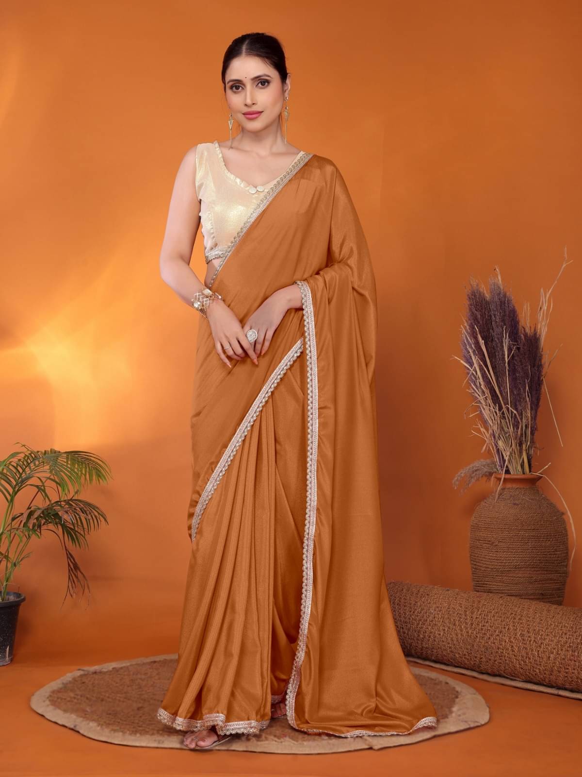 BLEESBURY Zimmy Choo Solid Saree With Unstitched Blouse Piece ( Brown ) BLEESBURY Zimmy Choo Solid Saree With Unstitched Blouse Piece ( Brown )