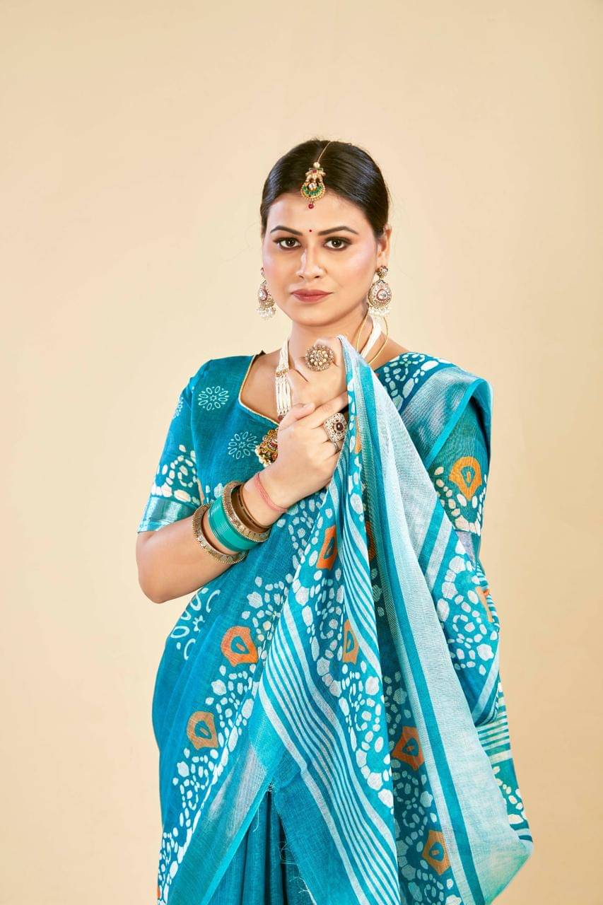 Ethnic Trendz Cotton Printed Saree With Unstitched Blouse Piece ( Blue )     			Ethnic Trendz Cotton Printed Saree With Unstitched Blouse Piece ( Blue )