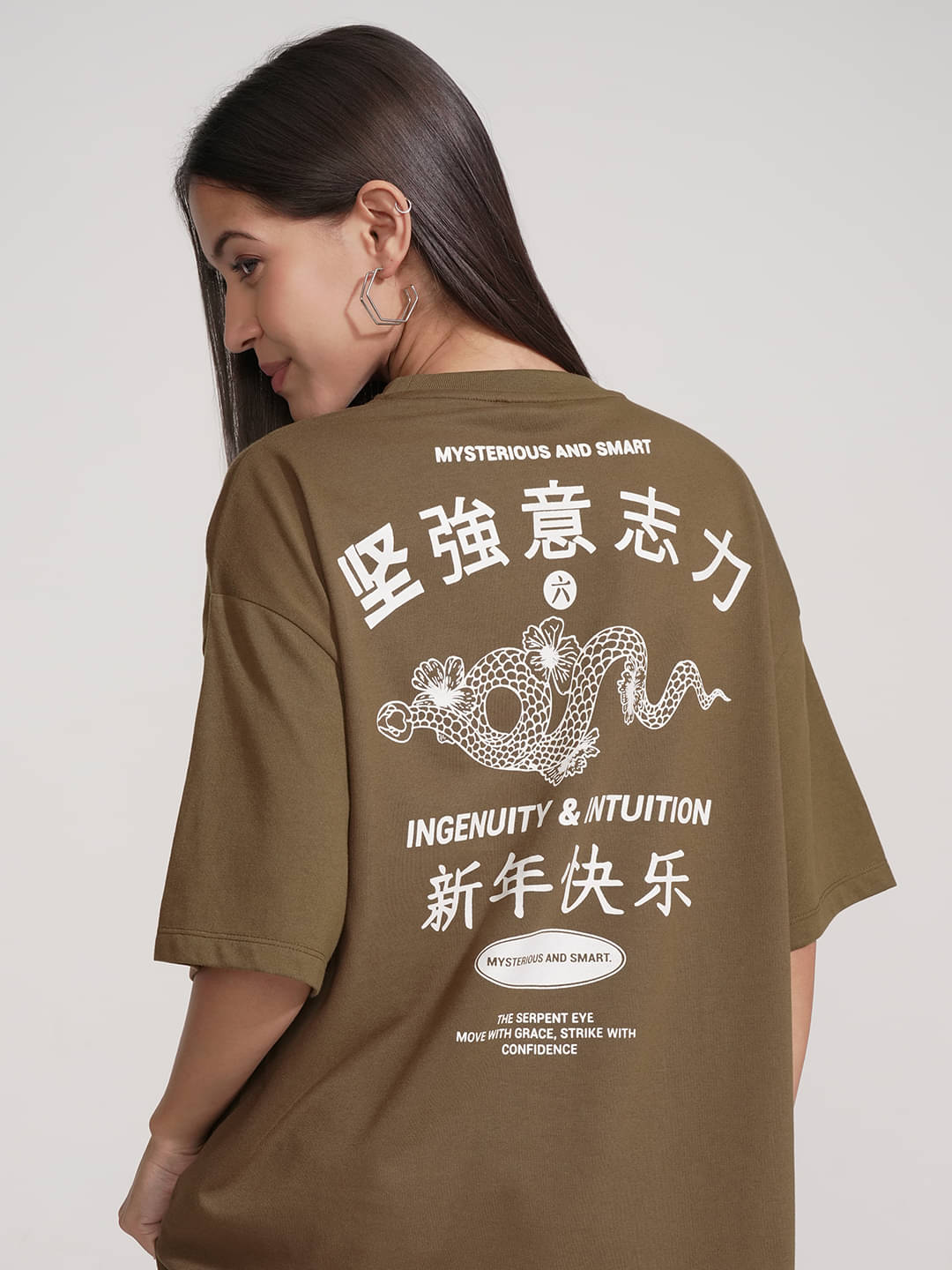     			Tokyo Talkies Women Cotton Blend Solid Oversized Fit Round Neck T-Shirt ( Brown )