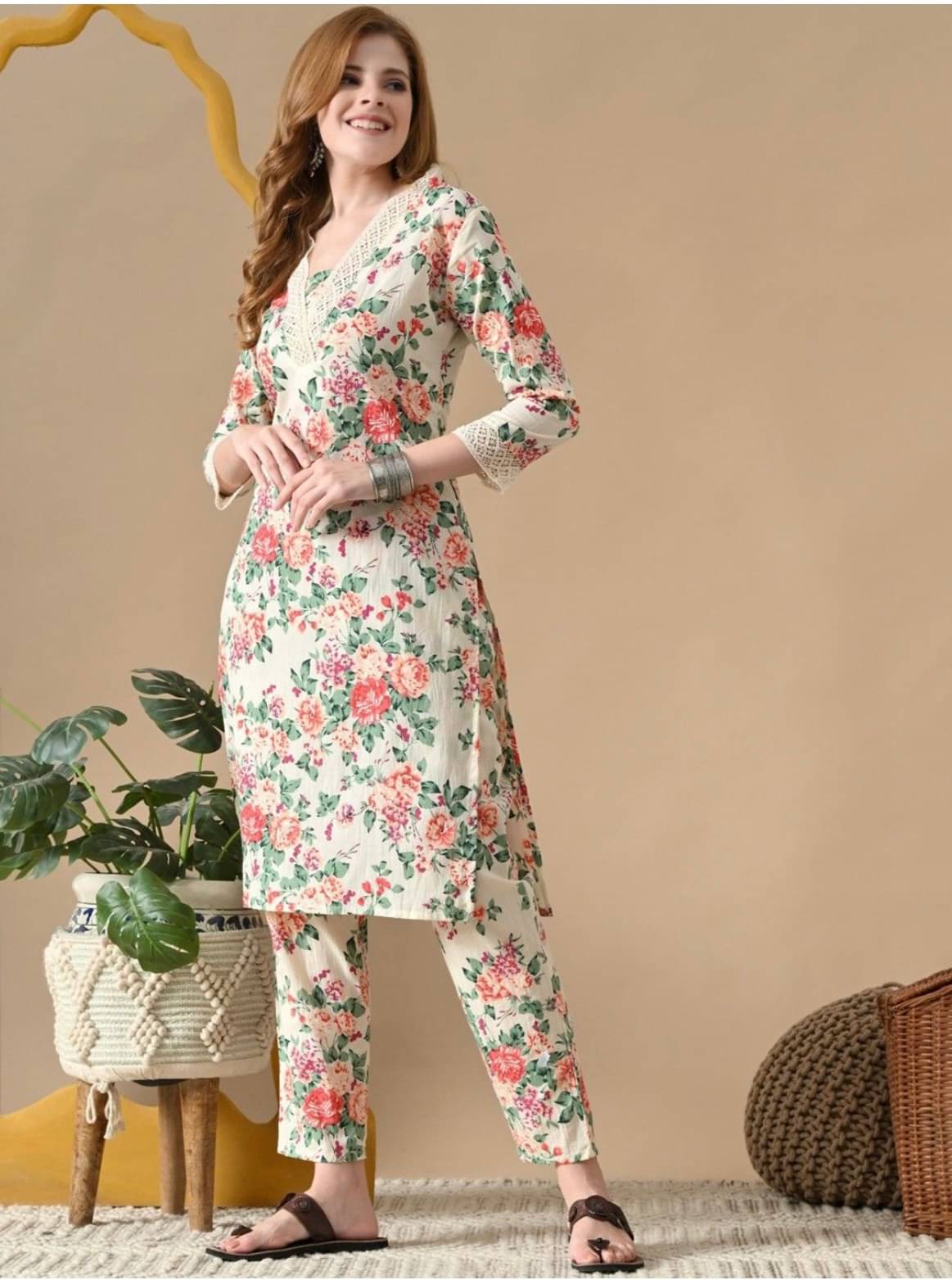     			YAGNIK FASHION Women Cotton Blend Self Design Flared Kurti With Pants ( Off White )