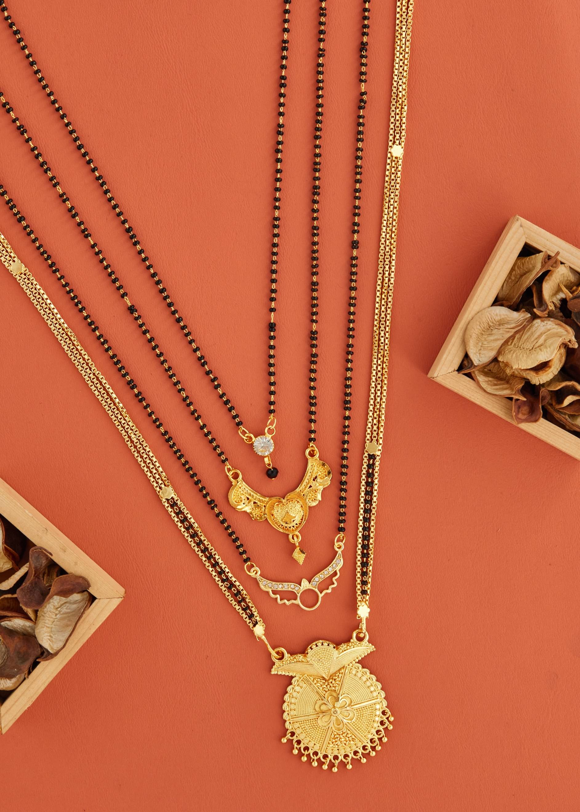 KIEICE Golden Mangalsutra Set ( Pack of 4 )     			KIEICE Golden Mangalsutra Set ( Pack of 4 )