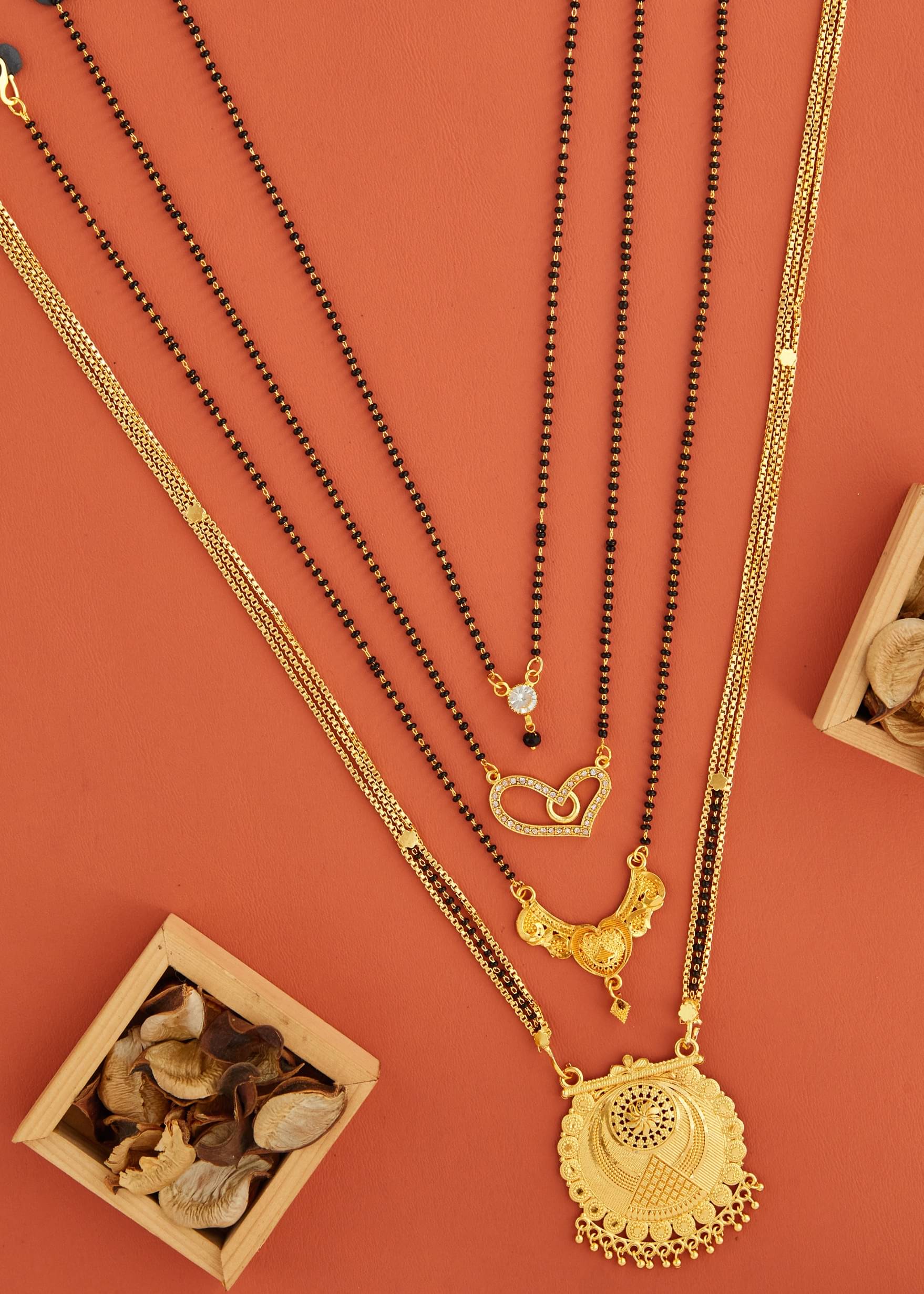 KIEICE Golden Mangalsutra Set ( Pack of 4 ) KIEICE Golden Mangalsutra Set ( Pack of 4 )