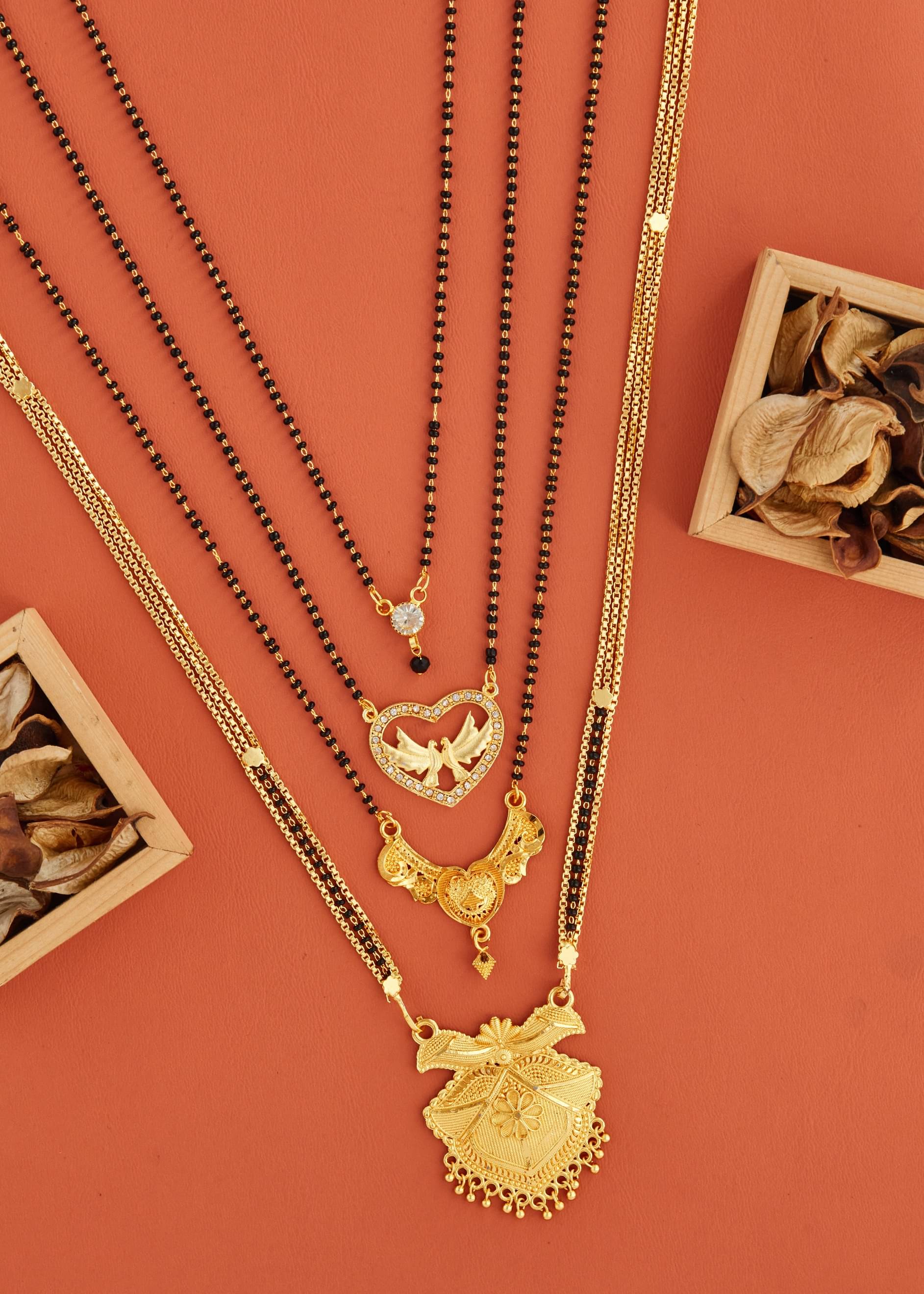 KIEICE Golden Mangalsutra Set ( Pack of 4 )     			KIEICE Golden Mangalsutra Set ( Pack of 4 )