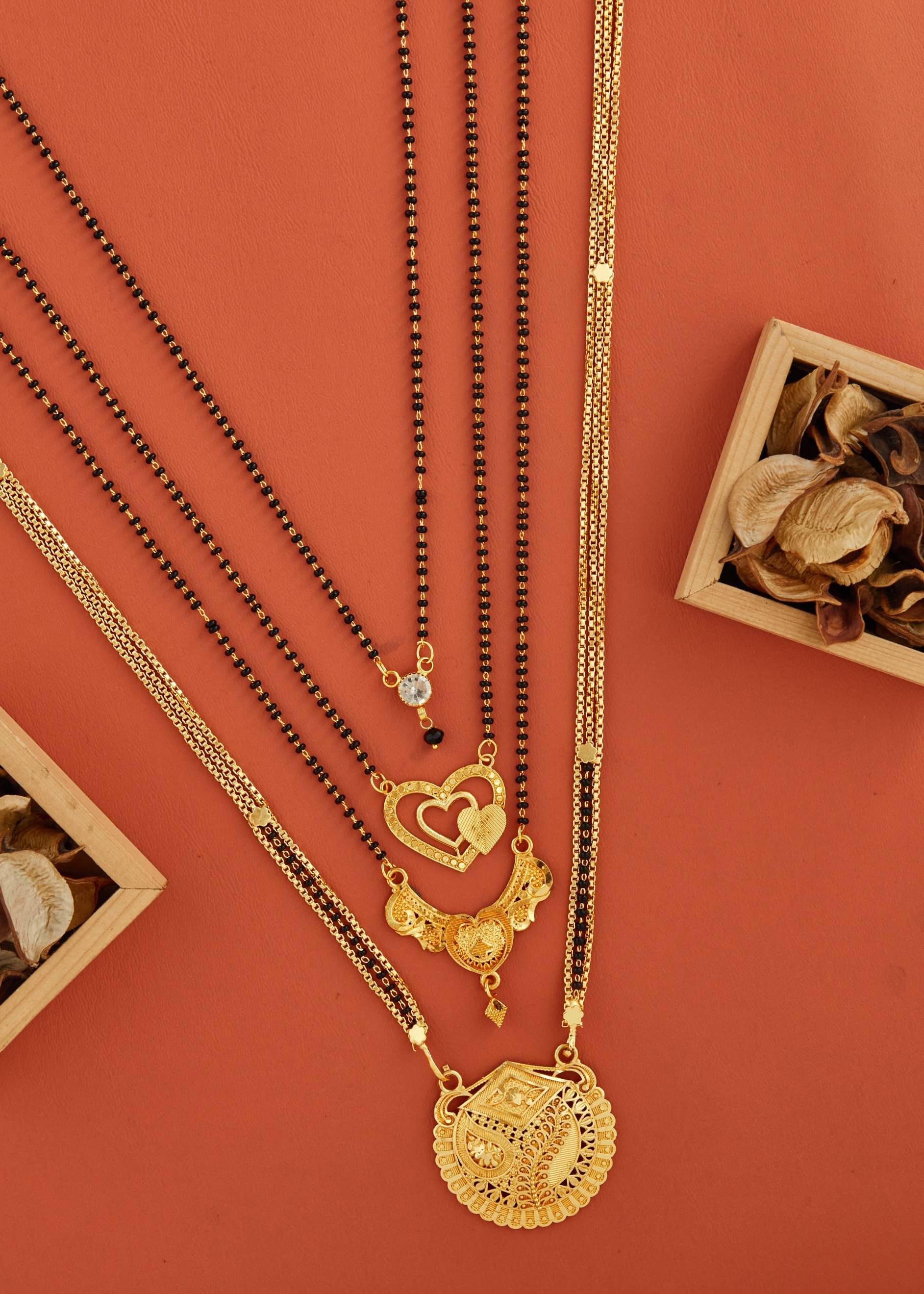 KIEICE Golden Mangalsutra Set ( Pack of 4 )     			KIEICE Golden Mangalsutra Set ( Pack of 4 )