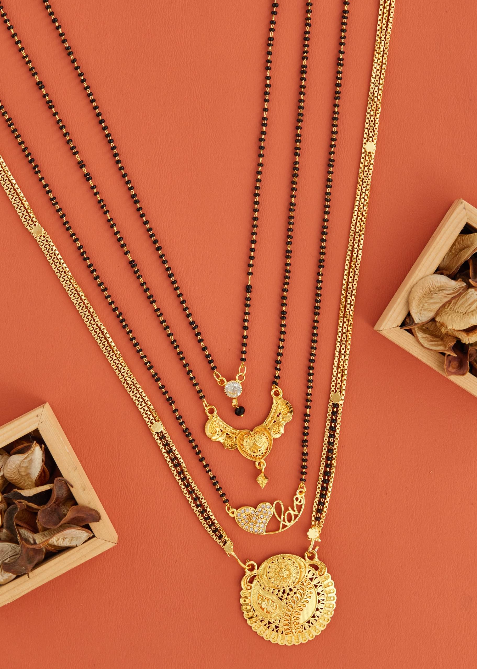 KIEICE Golden Mangalsutra Set ( Pack of 4 )     			KIEICE Golden Mangalsutra Set ( Pack of 4 )