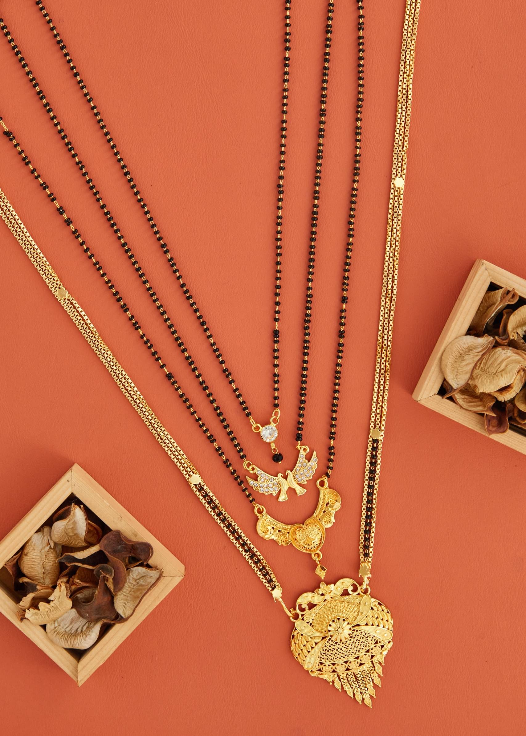 KIEICE Golden Mangalsutra Set ( Pack of 4 )     			KIEICE Golden Mangalsutra Set ( Pack of 4 )