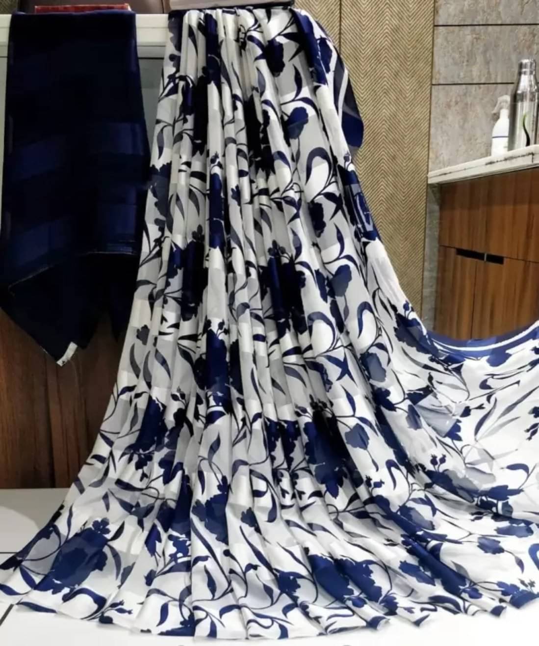 SHIRODHARI Satin Printed Saree With Unstitched Blouse Piece ( Navy Blue ) SHIRODHARI Satin Printed Saree With Unstitched Blouse Piece ( Navy Blue )