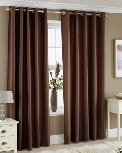     			Tramb Solid Room Darkening Eyelet Curtain 7 ft ( Pack of 2 ) - Brown
