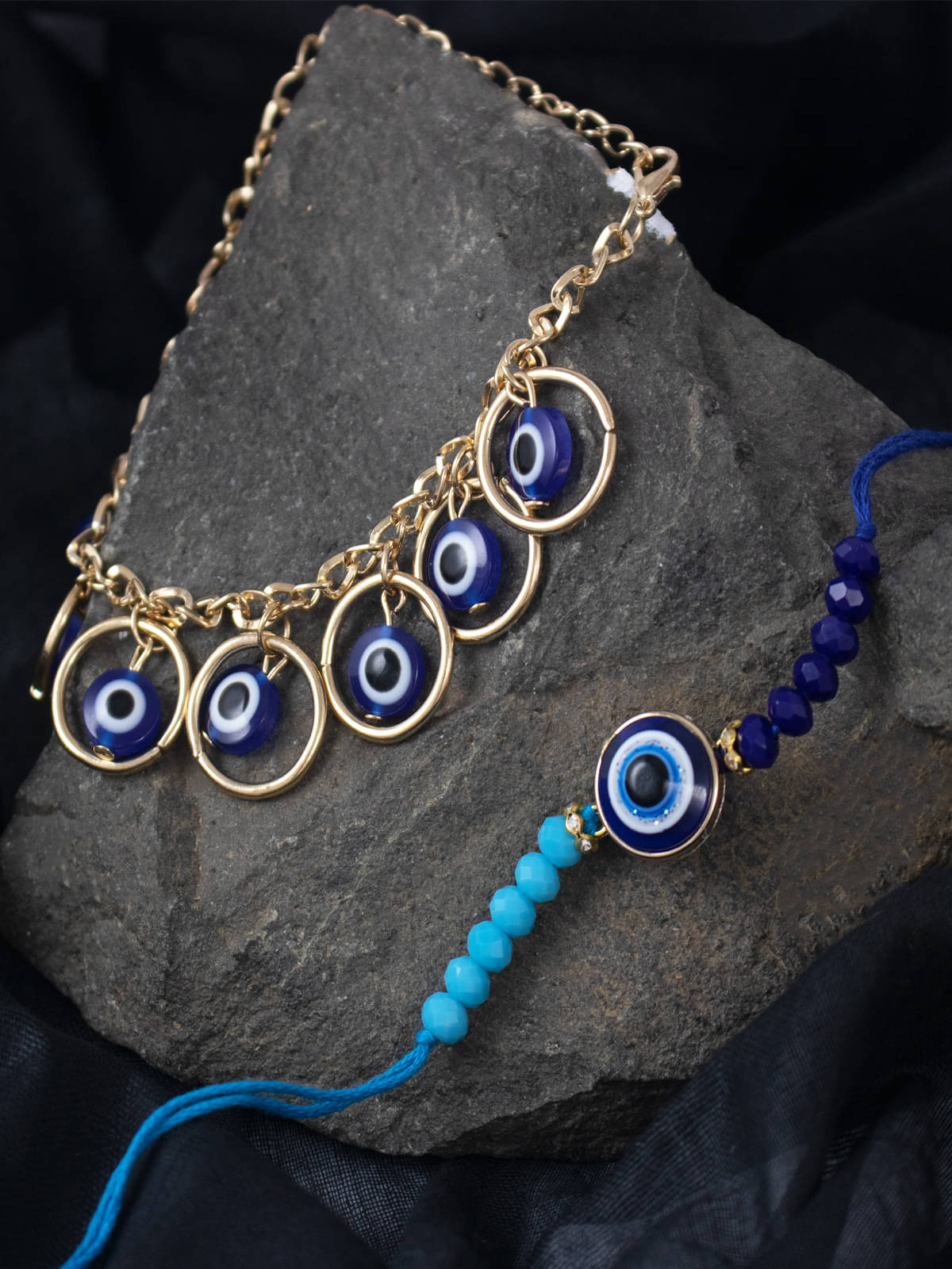     			Combo of Fancy Evil Eye Handcrafted Protection Rakhi for Bhaiya Bhabhi with Roli Chawal and Written Greeting Note.