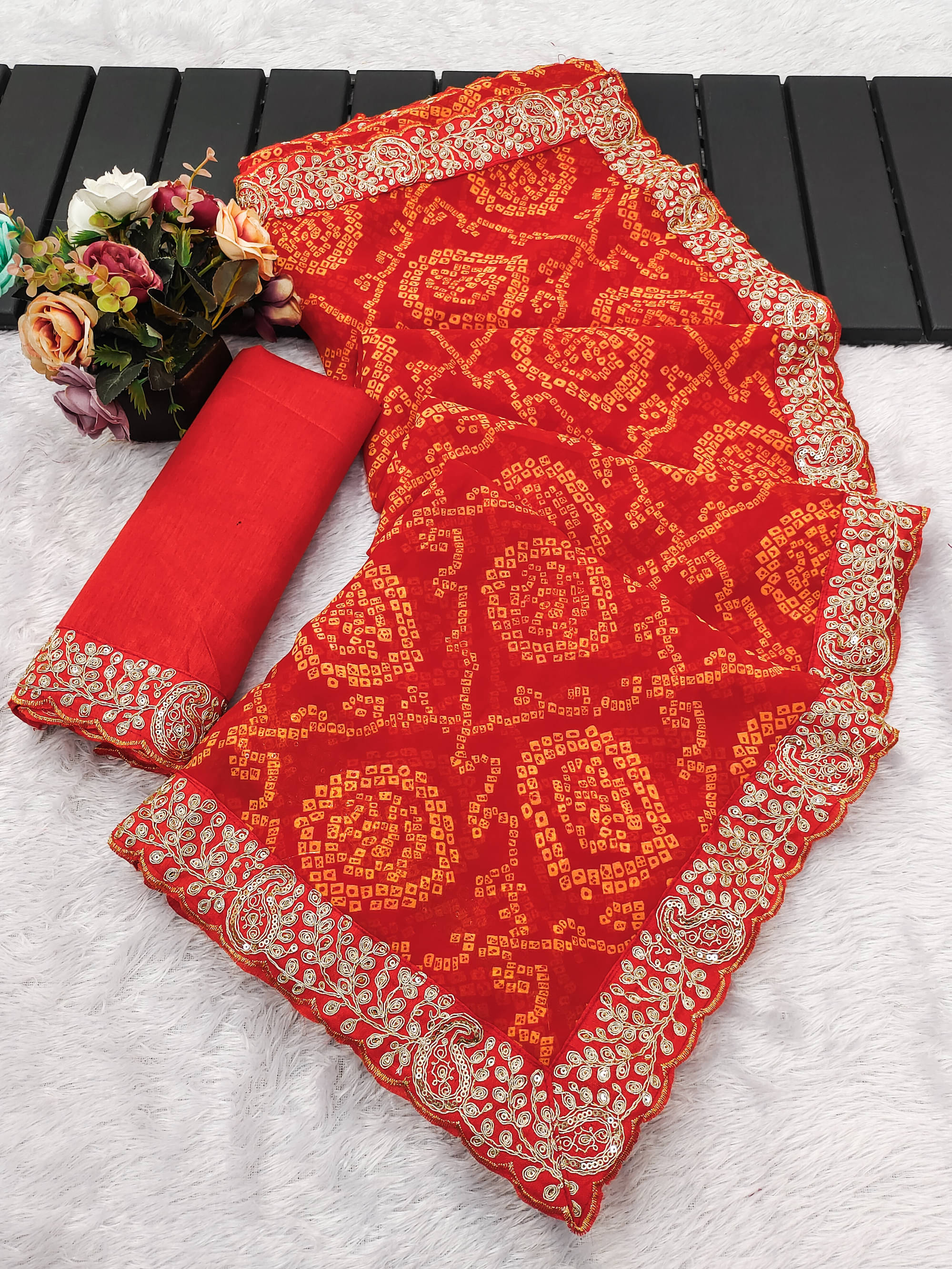 Parmila Fashion Chiffon Embellished Bandhani Sarees With Unstitched Blouse Piece ( Orange )     			Parmila Fashion Chiffon Embellished Bandhani Sarees With Unstitched Blouse Piece ( Orange )