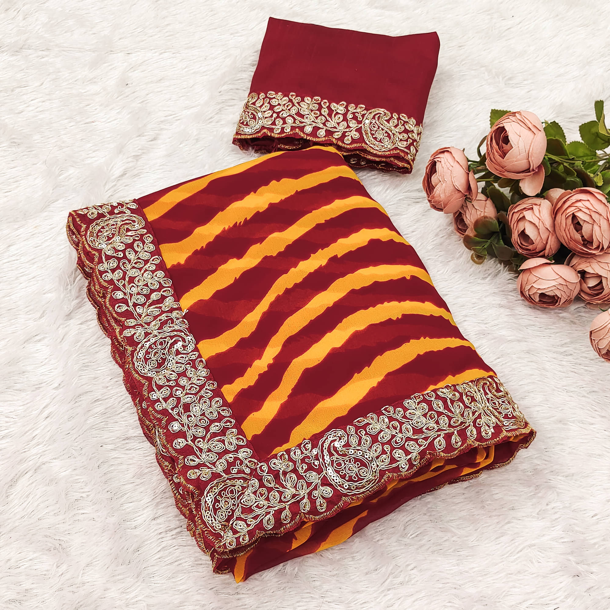 Parmila Fashion Chiffon Embellished Leheriya Saree With Unstitched Blouse Piece ( Maroon ) Parmila Fashion Chiffon Embellished Leheriya Saree With Unstitched Blouse Piece ( Maroon )