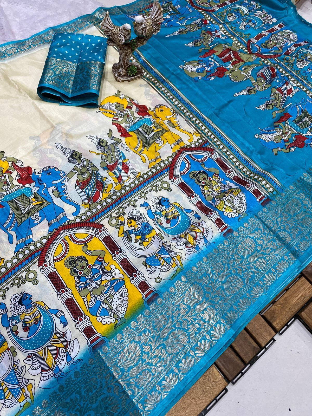 Bansari Textile Silk Blend Printed Jamdani Saree With Unstitched Blouse Piece ( Light Blue )     			Bansari Textile Silk Blend Printed Jamdani Saree With Unstitched Blouse Piece ( Light Blue )
