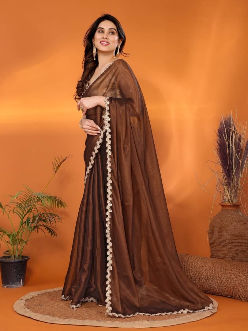     			Shree Sai Enterprise Jimmy Choo Solid Regular Saree With Stitched Blouse ( Brown )