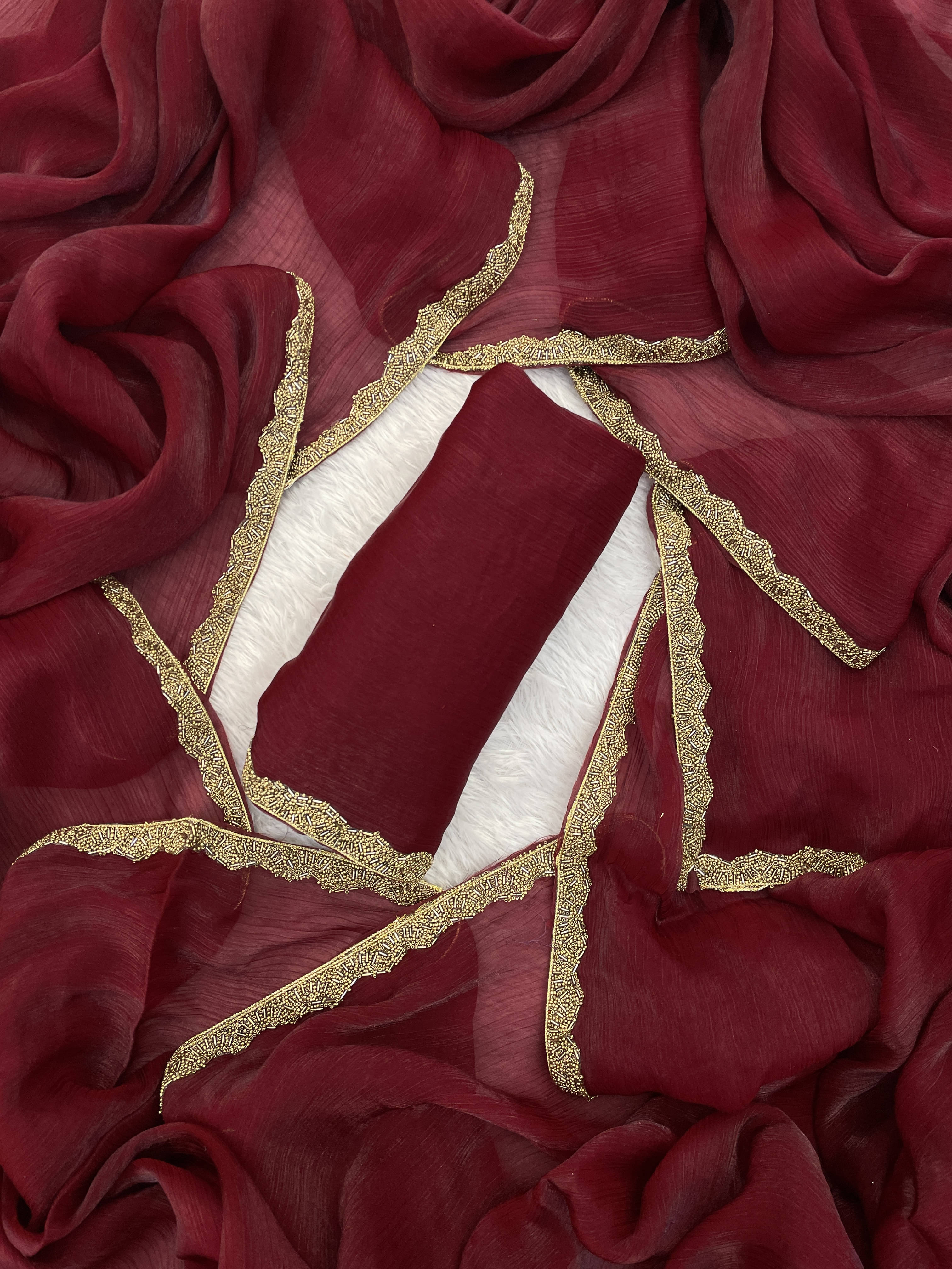     			VRAGI Chiffon Solid Regular Saree With Unstitched Blouse Piece ( Maroon )